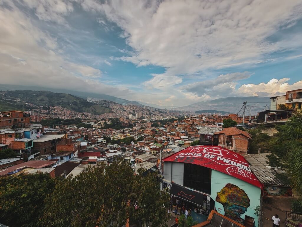 Explore the vibrant and sprawling cityscape of Medellín, showcasing its unique blend of architecture and culture., Medellín