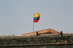 Colorful Colombian flag waving at a historic fort in sunny Cartagena, Colombia., Cartagena