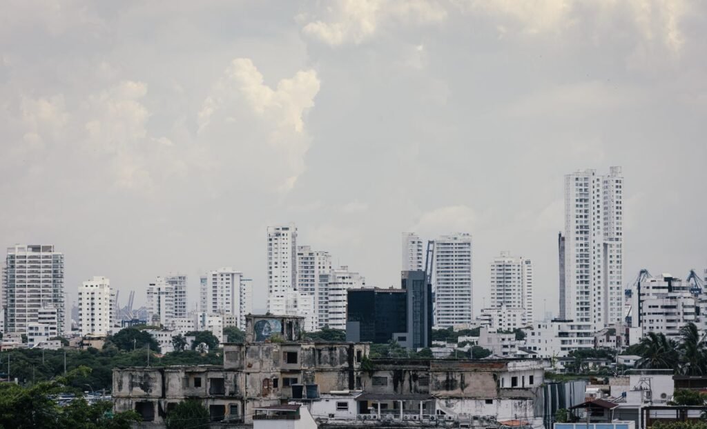 Skyline of Cartagena, Colombia, showcasing modern skyscrapers alongside historical architecture., Cartagena