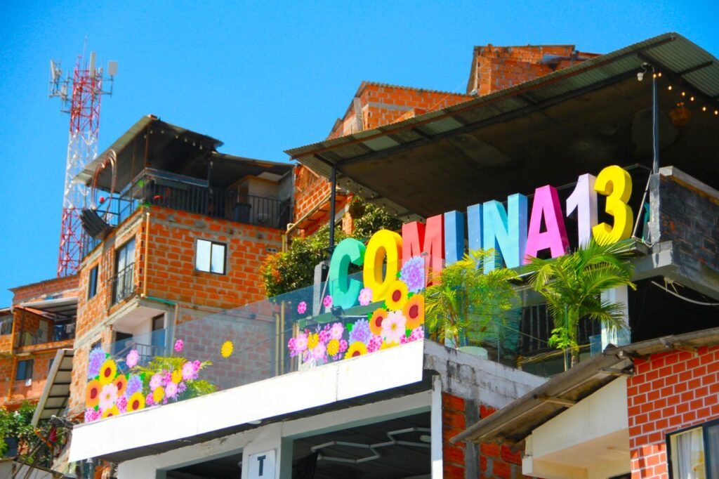 Vibrant street art in Comuna 13, Medellin showcases urban culture and tourism appeal.