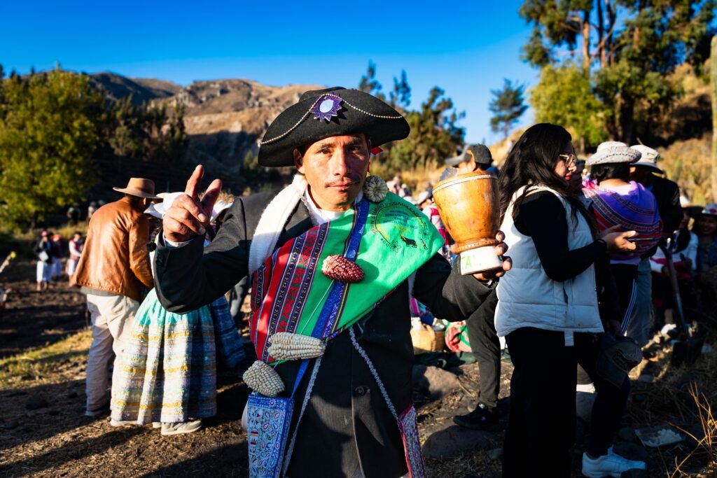 Colorful Andean festival in Caylloma, Peru showcasing traditional costumes and cultural heritage. Turismo cultural